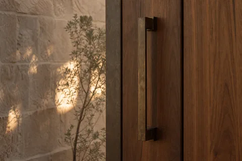 Bronze door detail of a desert home